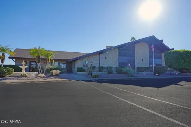 a view of a street with a building in the background