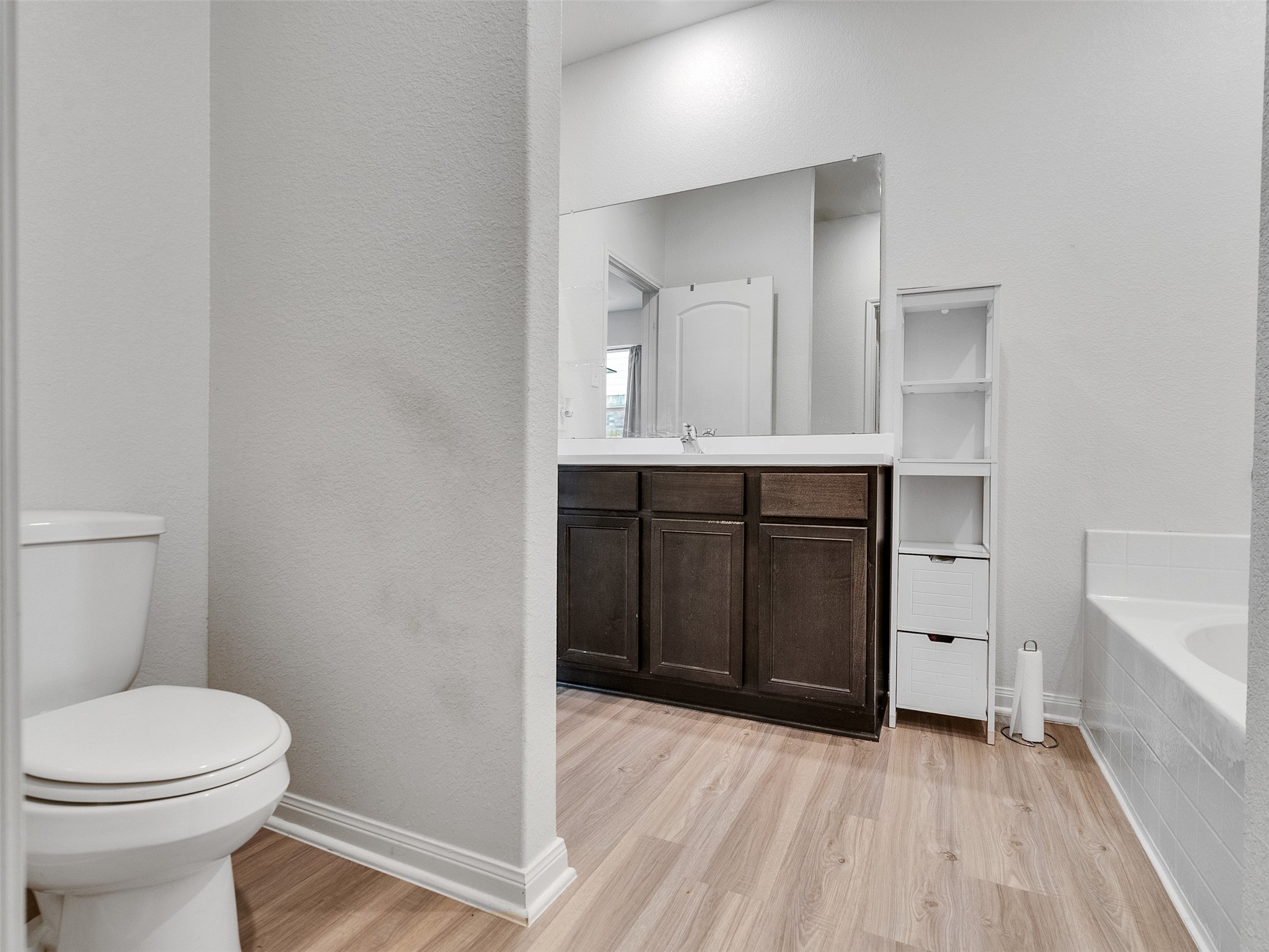 2123 Mule Ridge Drive Katy, TX 77493 - Photo 21 of 22 a bathroom with a sink and a toilet