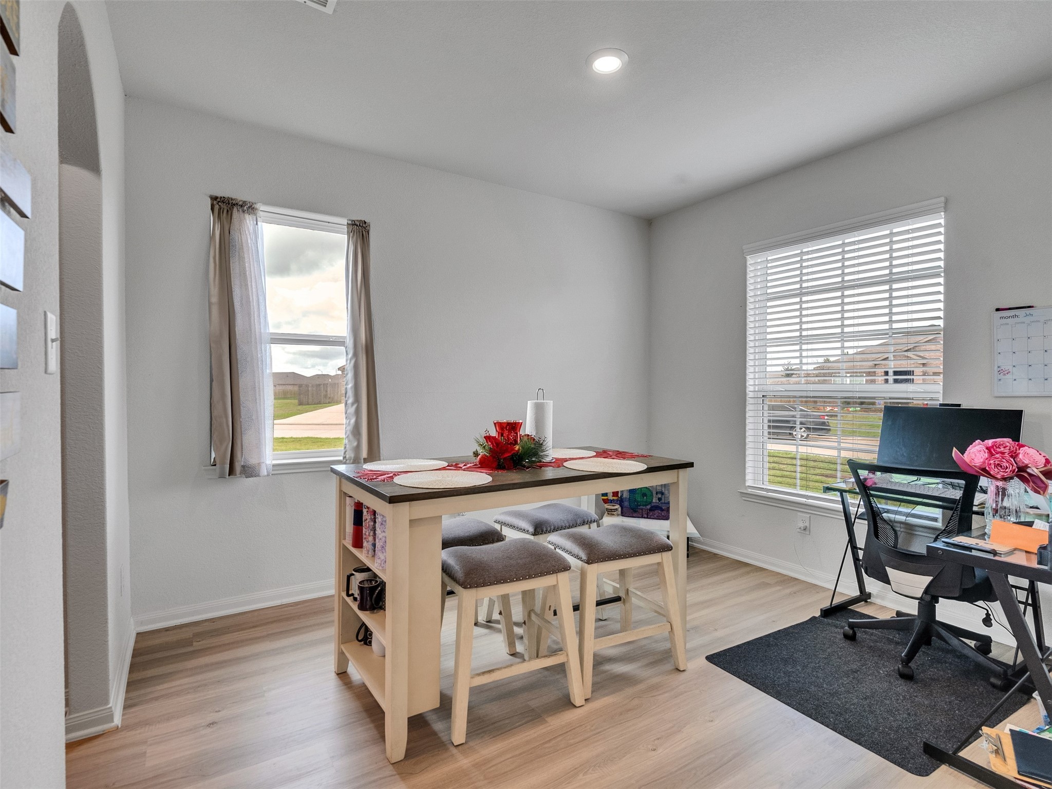 2123 Mule Ridge Drive Katy, TX 77493 - Photo 4 of 22 a view of a workspace with furniture and a window
