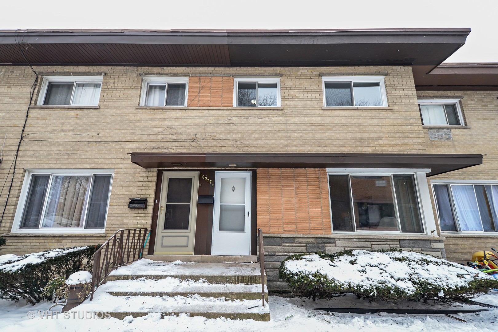 10077 Frontage Road, Unit E Skokie, IL 60077 - Photo 1 of 10 a front view of a house