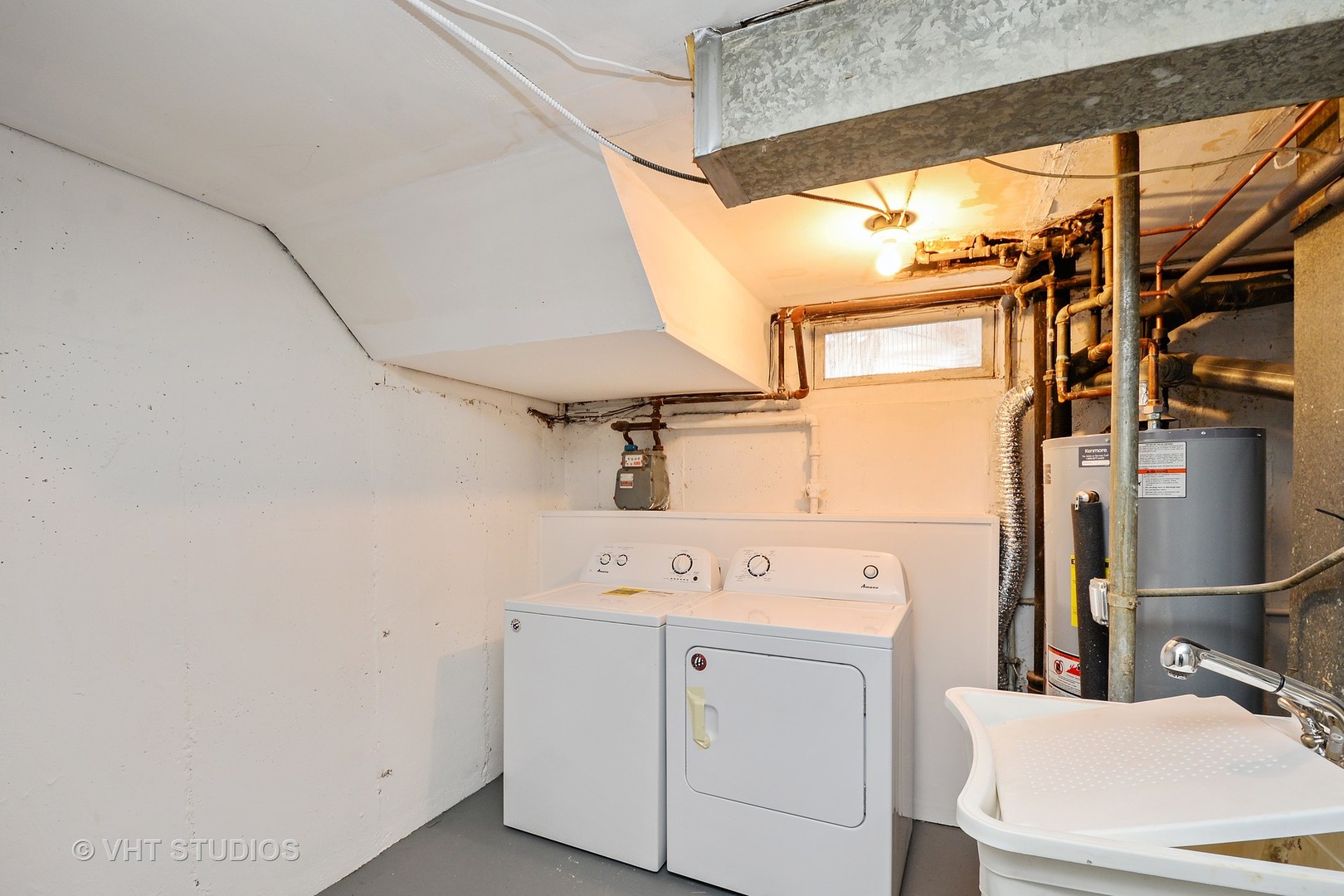 10077 Frontage Road, Unit E Skokie, IL 60077 - Photo 10 of 10 a utility room with dryer and washer