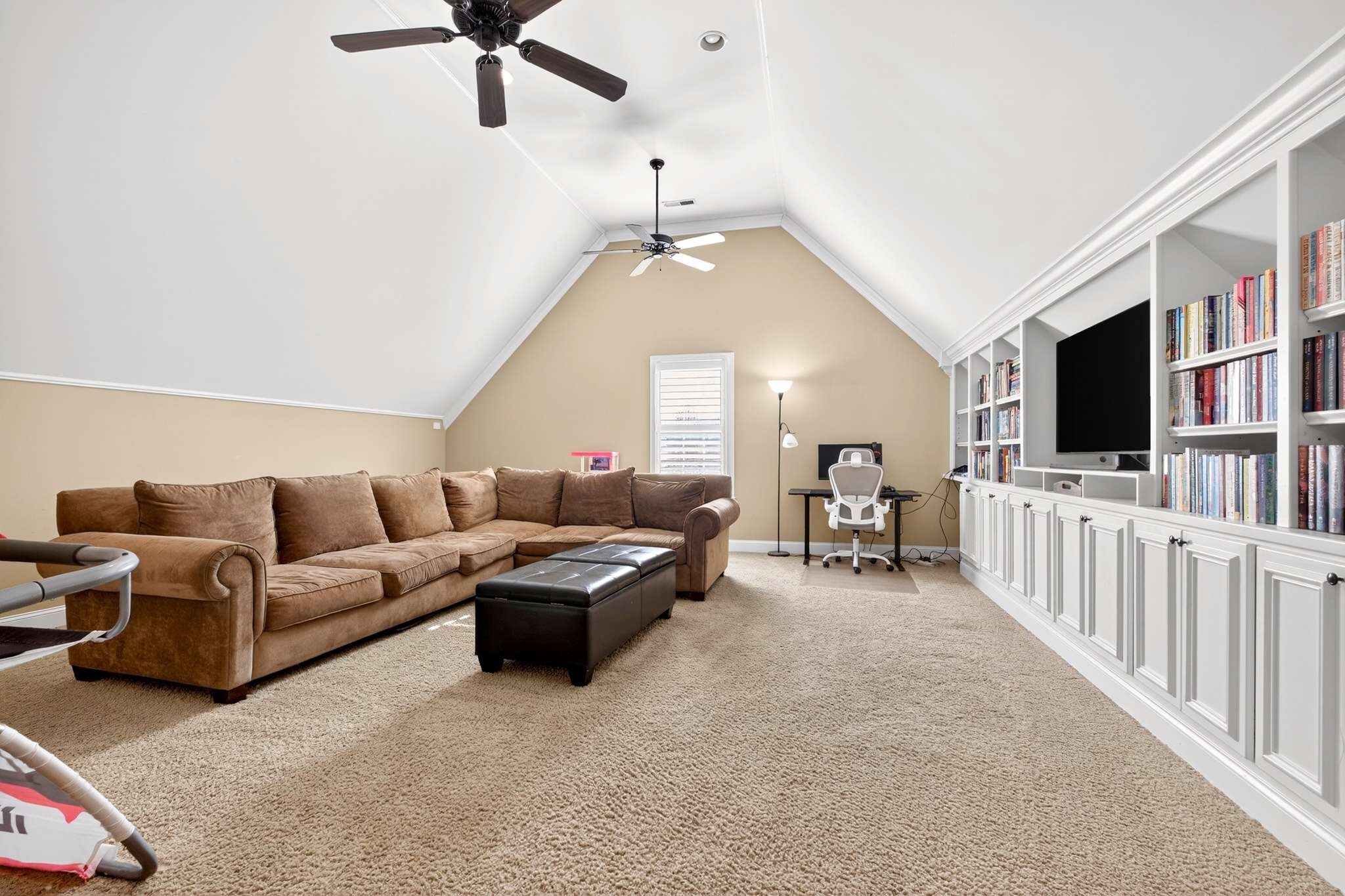 1007 Nealcrest Circle Spring Hill, TN 37174 - Photo 34 of 46 a living room with furniture and a flat screen tv