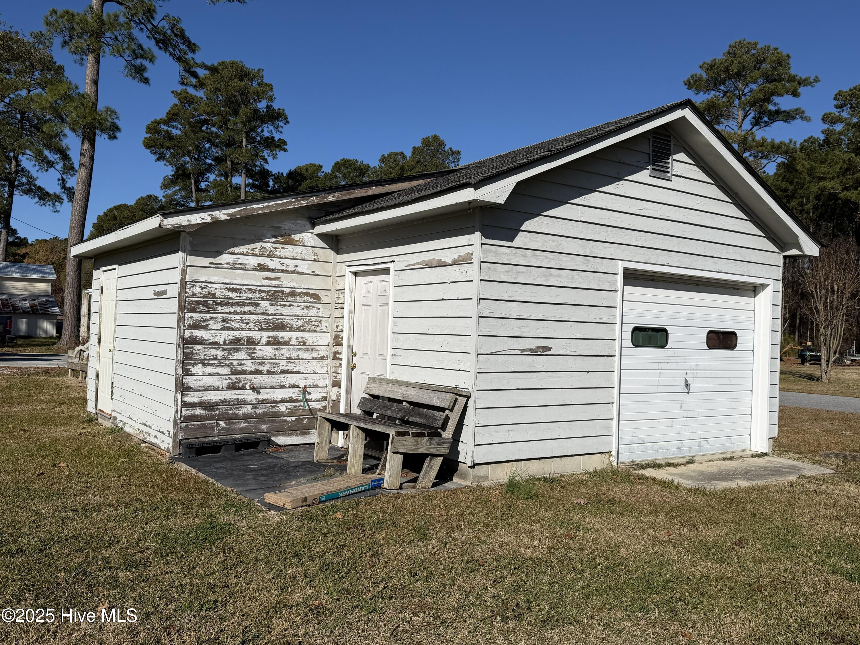 991 Pinecrest Road Bath, NC 27808 - Photo 42 of 57 Detached garage. Peeling paint is being sanded off and repainted.