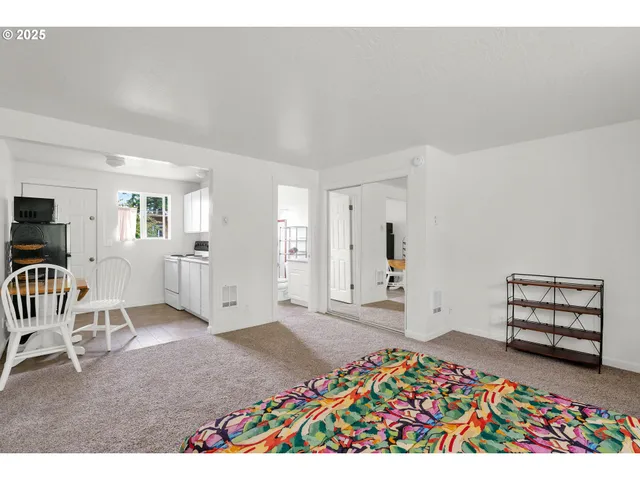 a view of an empty room and window