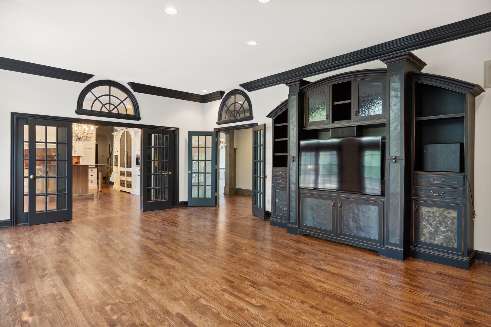 905 Voltz Road Northbrook, IL 60062 - Photo 15 of 58 a view of a big room with wooden floor and a window
