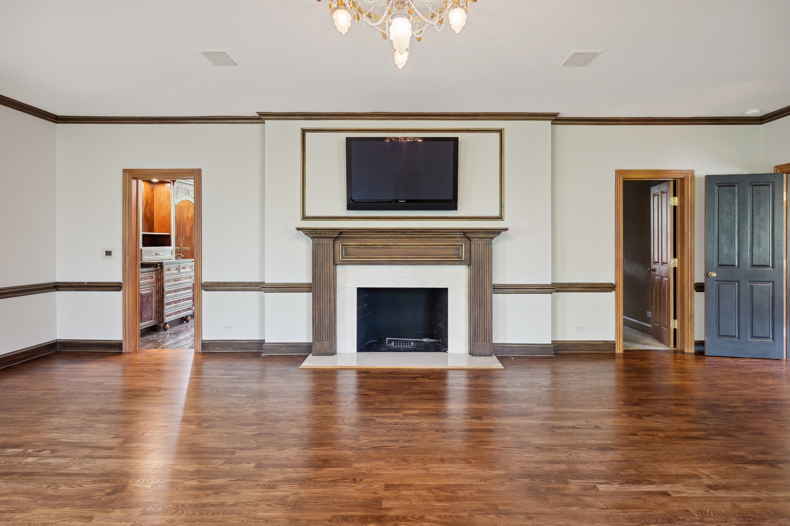 905 Voltz Road Northbrook, IL 60062 - Photo 29 of 58 a living room with furniture and a fireplace