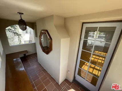 a kitchen with stainless steel appliances a refrigerator and a stove