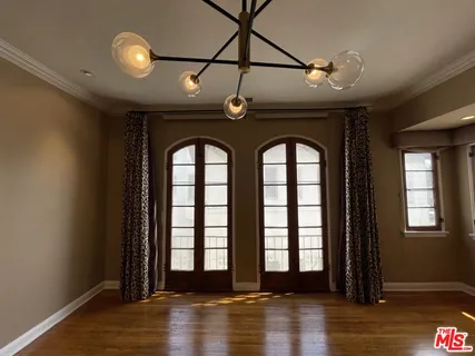 a bathroom with a shower and a sink