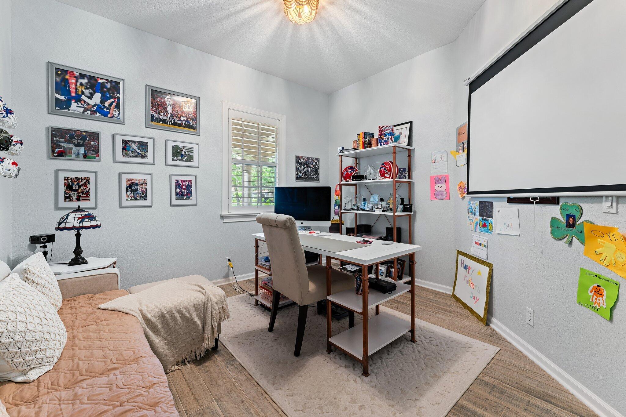 108 Via Azurra Jupiter, FL 33458 - Photo 15 of 78 a bedroom with furniture and a bed