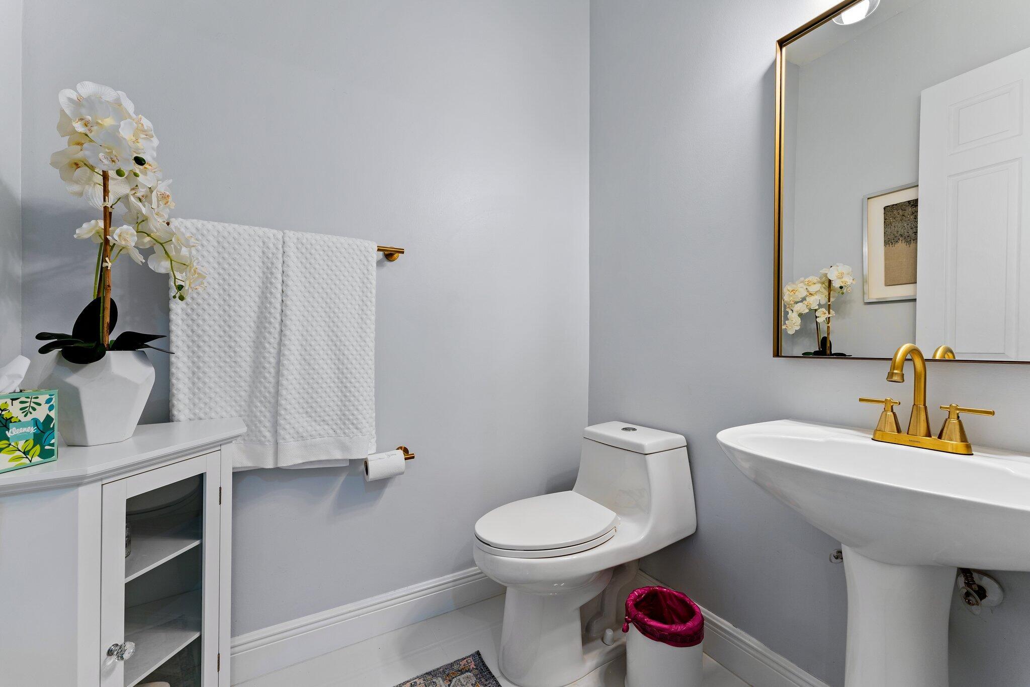 108 Via Azurra Jupiter, FL 33458 - Photo 38 of 78 Powder Room 1st Floor