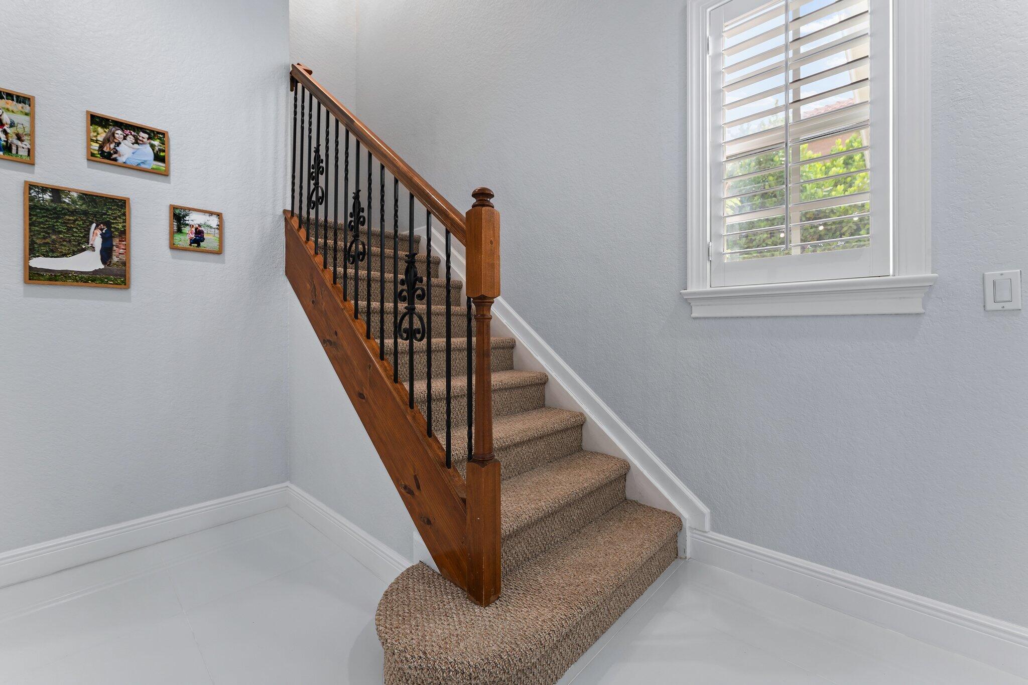 108 Via Azurra Jupiter, FL 33458 - Photo 42 of 78 a view of entryway and hall with wooden floor