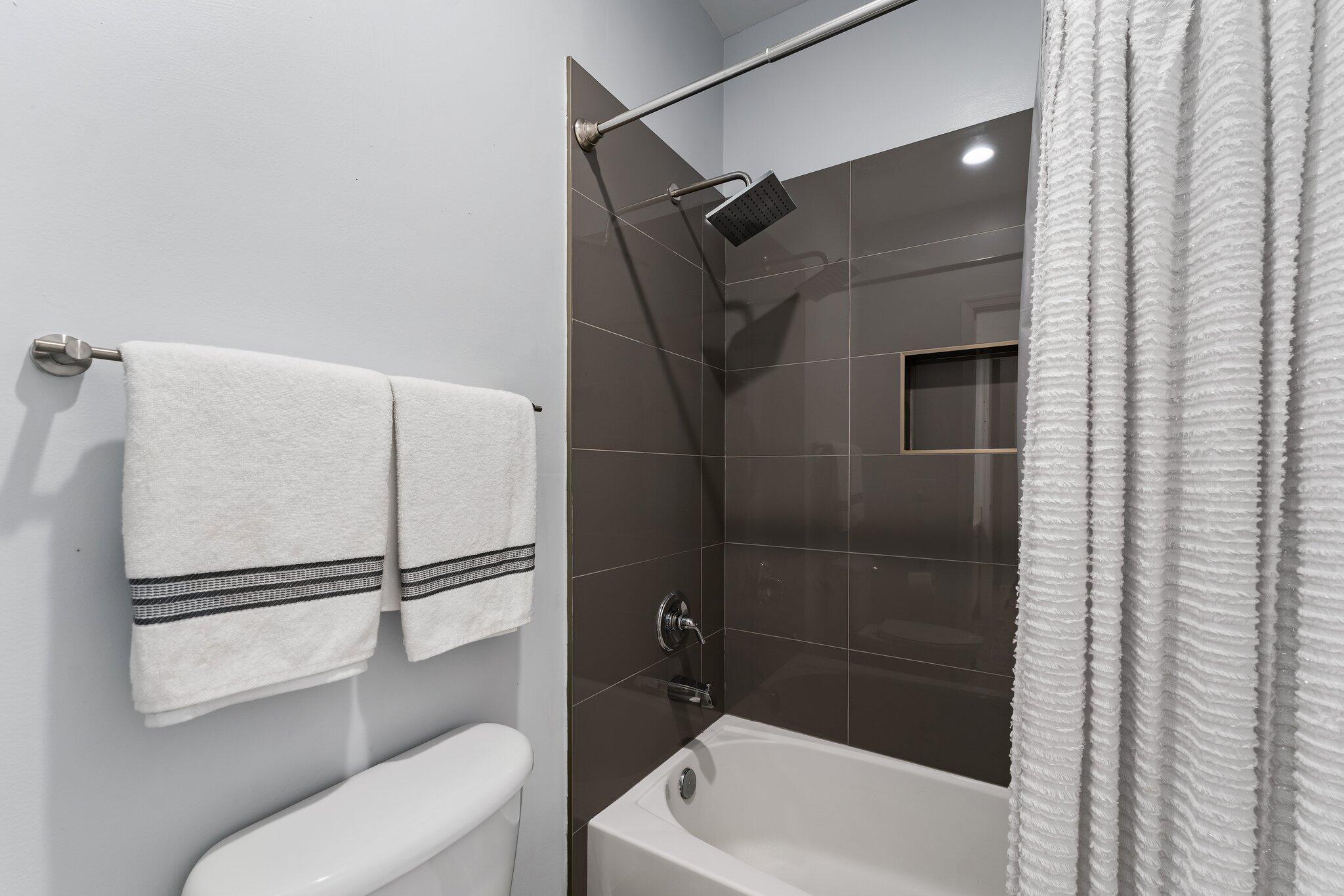 108 Via Azurra Jupiter, FL 33458 - Photo 55 of 78 a bathroom with a bathtub and a shower