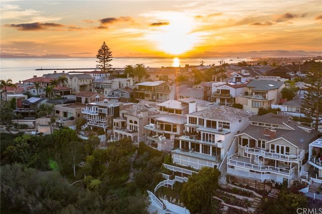 a view of city with ocean