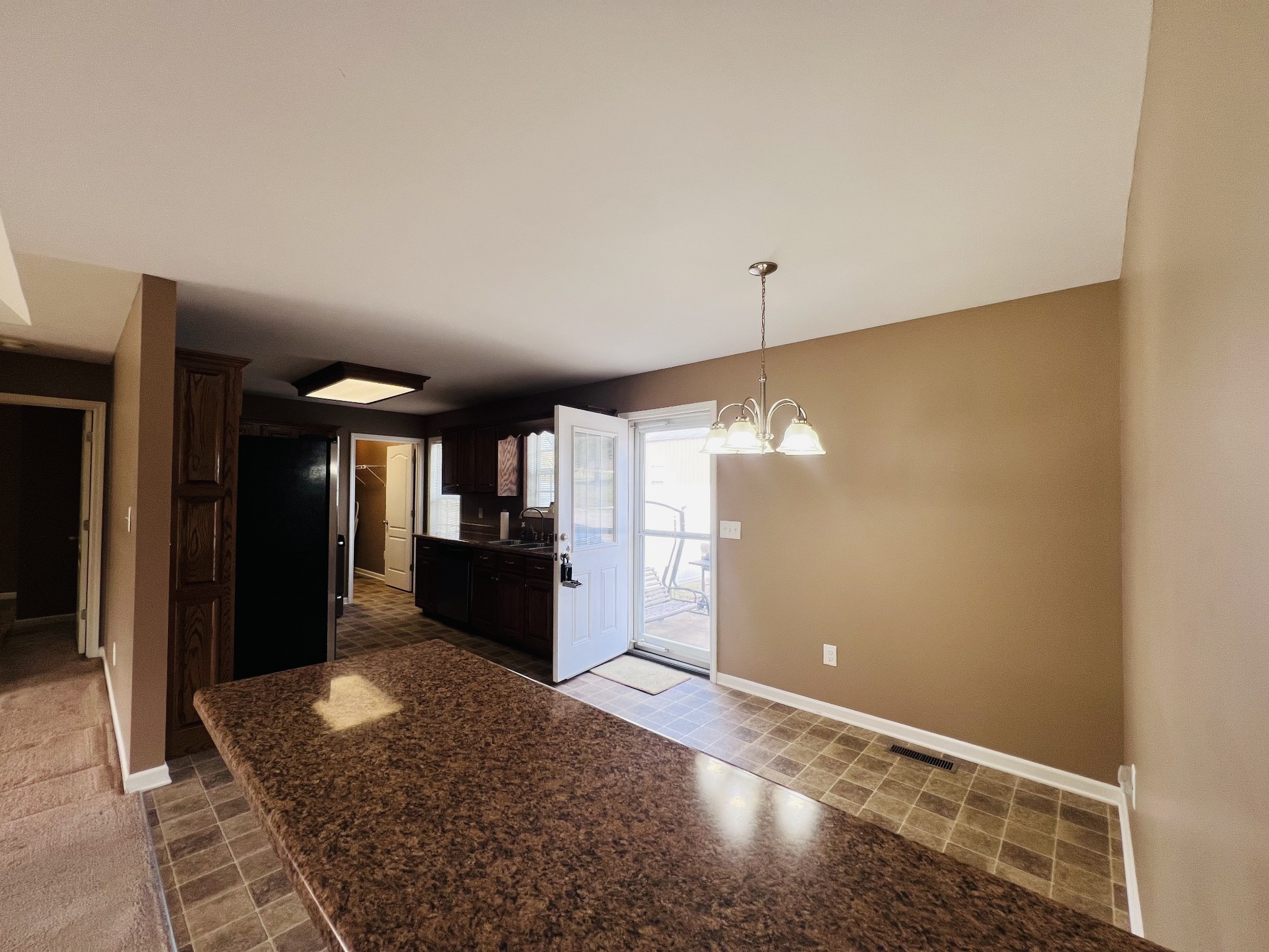 8659 Dog Branch Road Mount Pleasant, TN 38474 - Photo 19 of 44 a view of a hallway with wooden floor and staircase