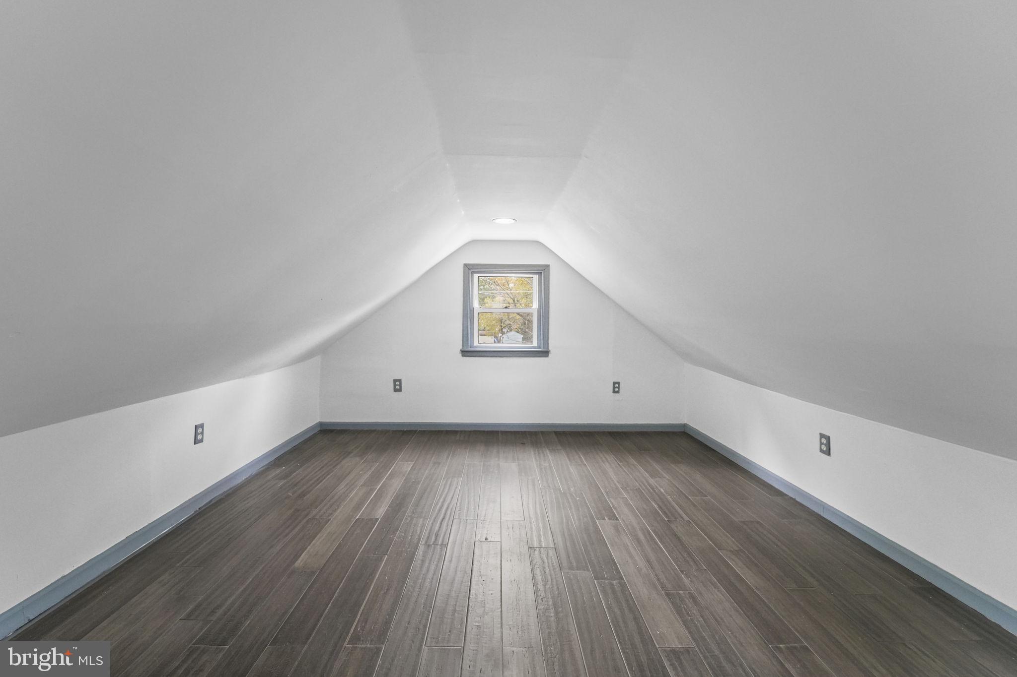 85 East 9th Avenue Pine Hill, NJ 08021 - Photo 17 of 27 a view of a room with wooden floors and window
