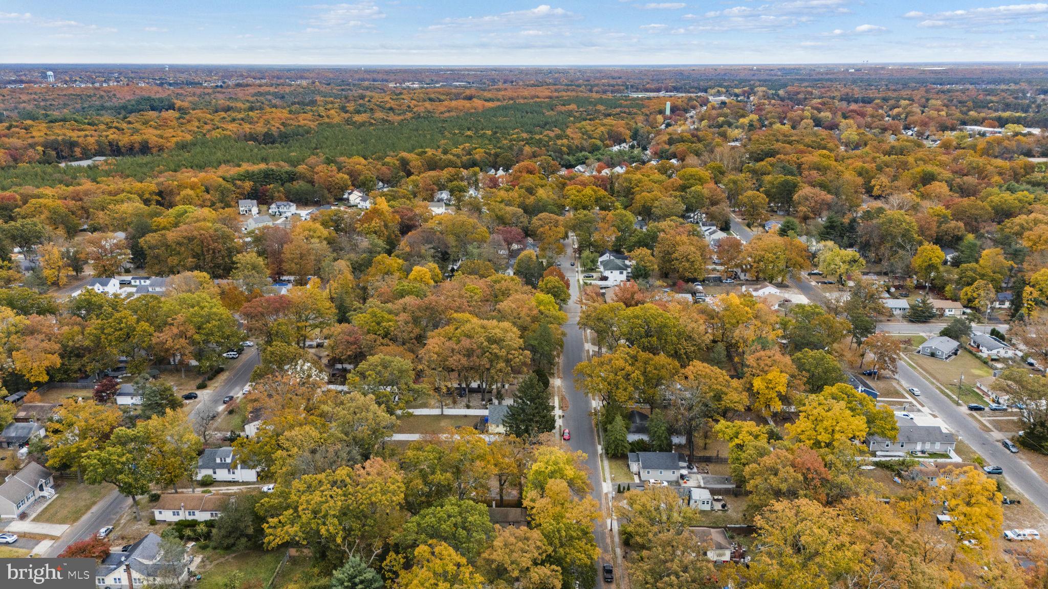 85 East 9th Avenue Pine Hill, NJ 08021 - Photo 26 of 27 an aerial view of residential building with parking space
