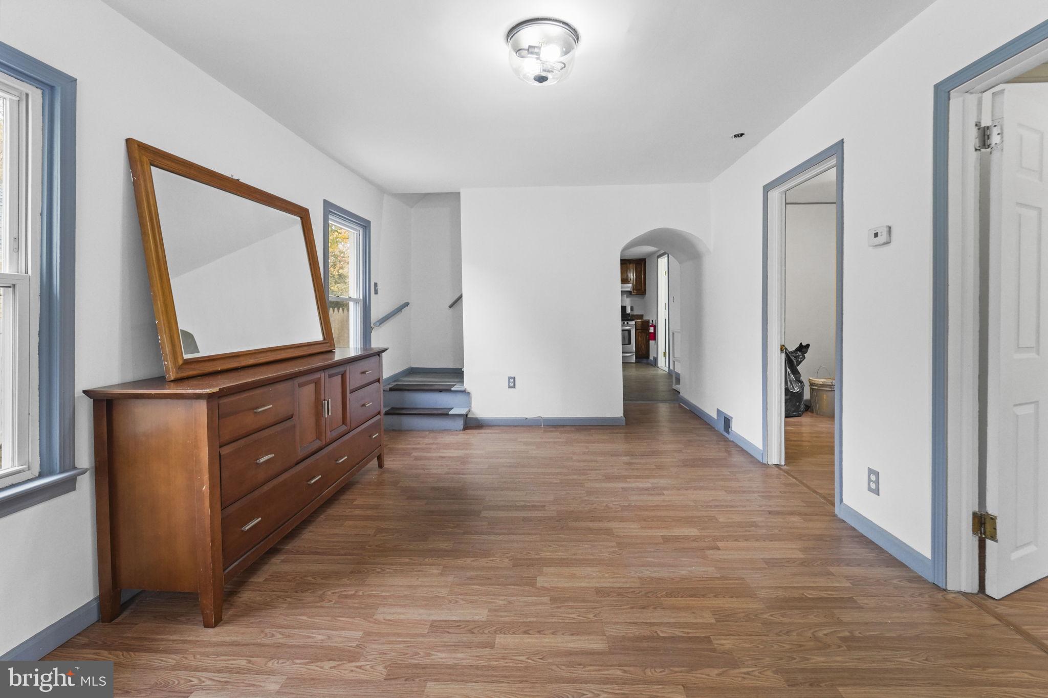 85 East 9th Avenue Pine Hill, NJ 08021 - Photo 5 of 27 a view of hallway with wooden floor