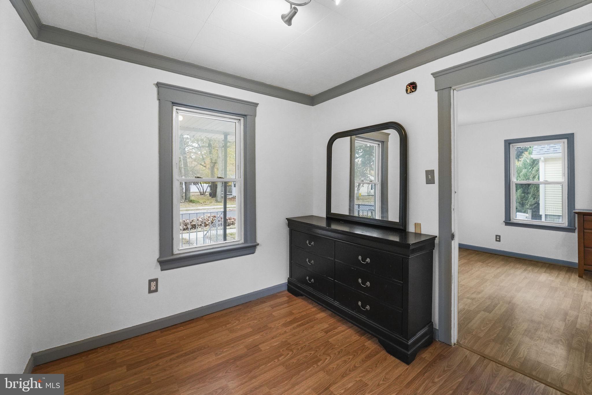 85 East 9th Avenue Pine Hill, NJ 08021 - Photo 7 of 27 a room with window and mirror