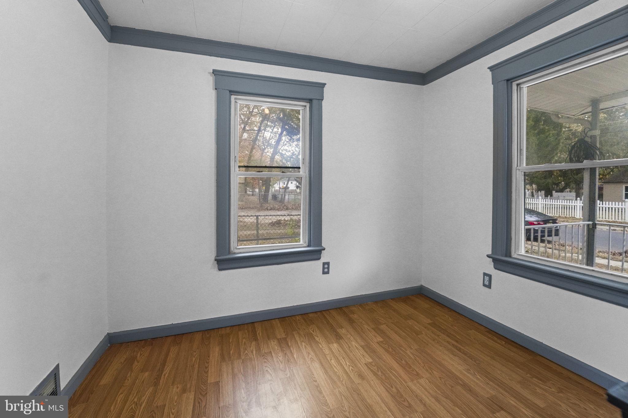 85 East 9th Avenue Pine Hill, NJ 08021 - Photo 8 of 27 an empty room with a window