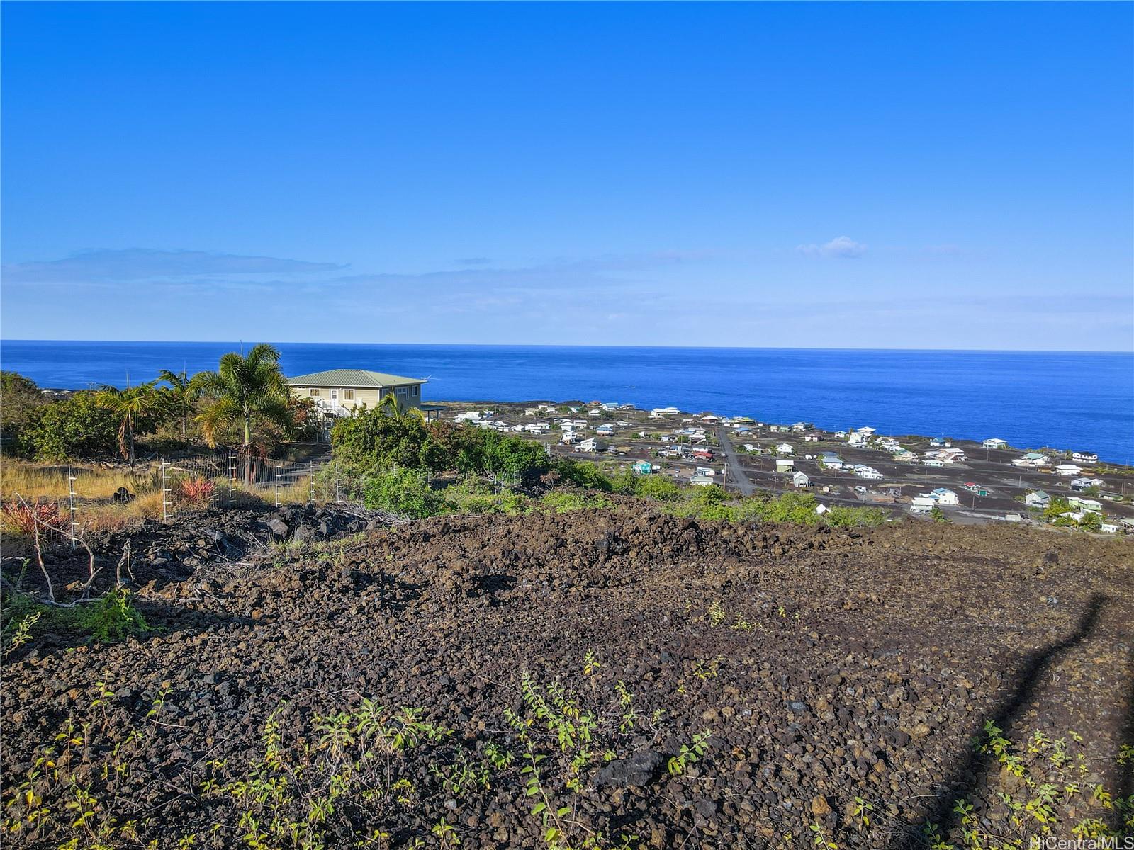 0 Pikake Avenue, Unit LOT 12 Captain Cook, HI 96704 - Photo 10 of 14 a view of a yard with an ocean