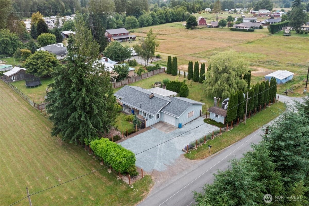 35632 Old Sultan-Startup Road Sultan, WA 98294 - Photo 32 of 40 an aerial view of multiple houses with yard