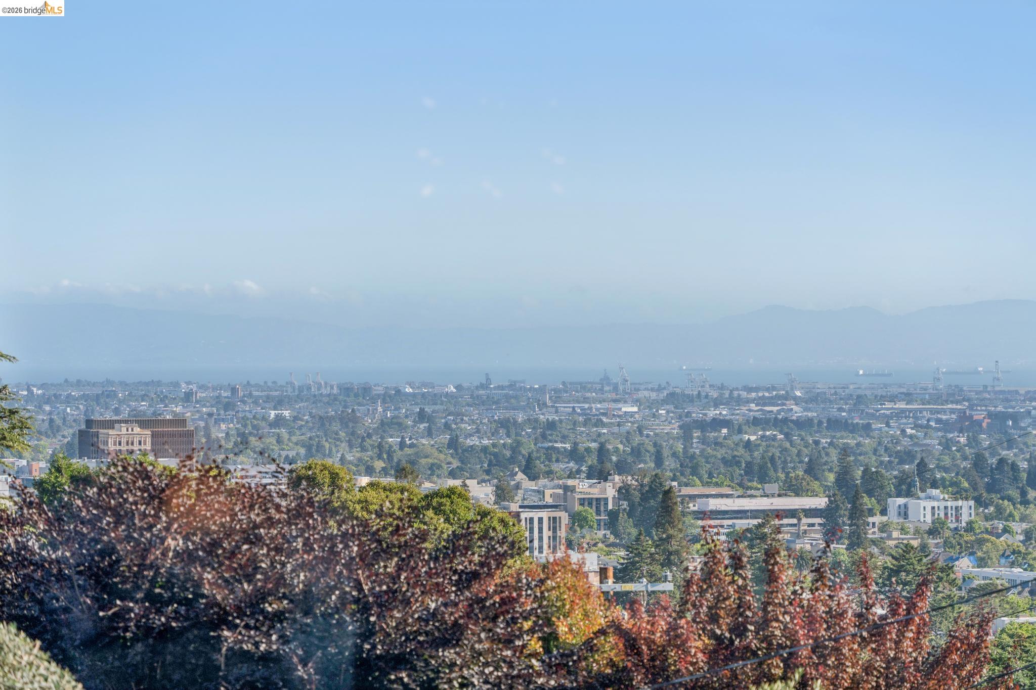 2301 Oak Street Berkeley, CA 94708 - Photo 40 of 61 Expansive cityscape panorama featuring a distant body of water and mountains under a clear sky
