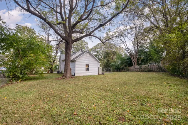 a house with trees in front of it