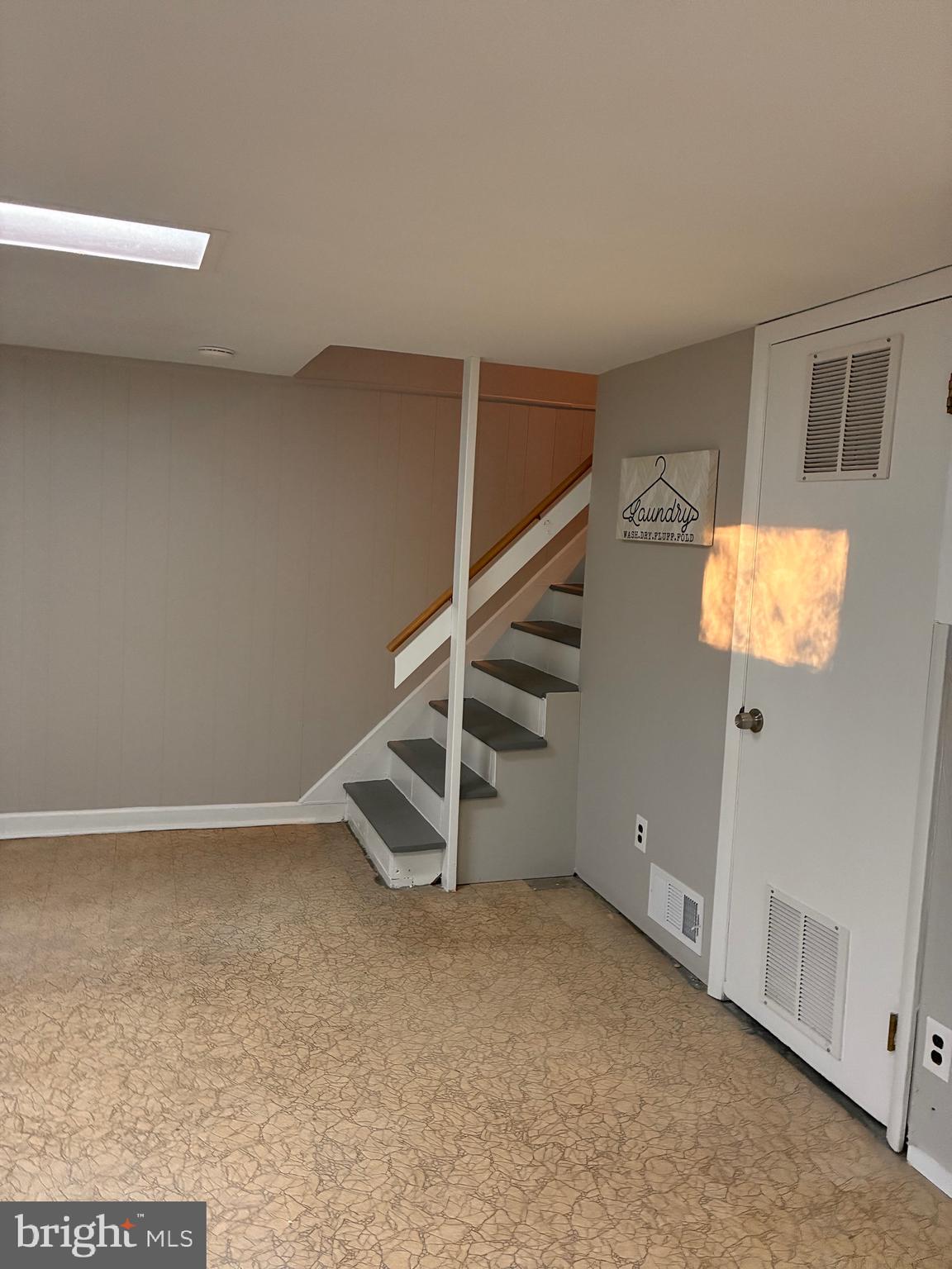 3033 Medway Street Silver Spring, MD 20902 - Photo 28 of 52 a view of an empty room with a window