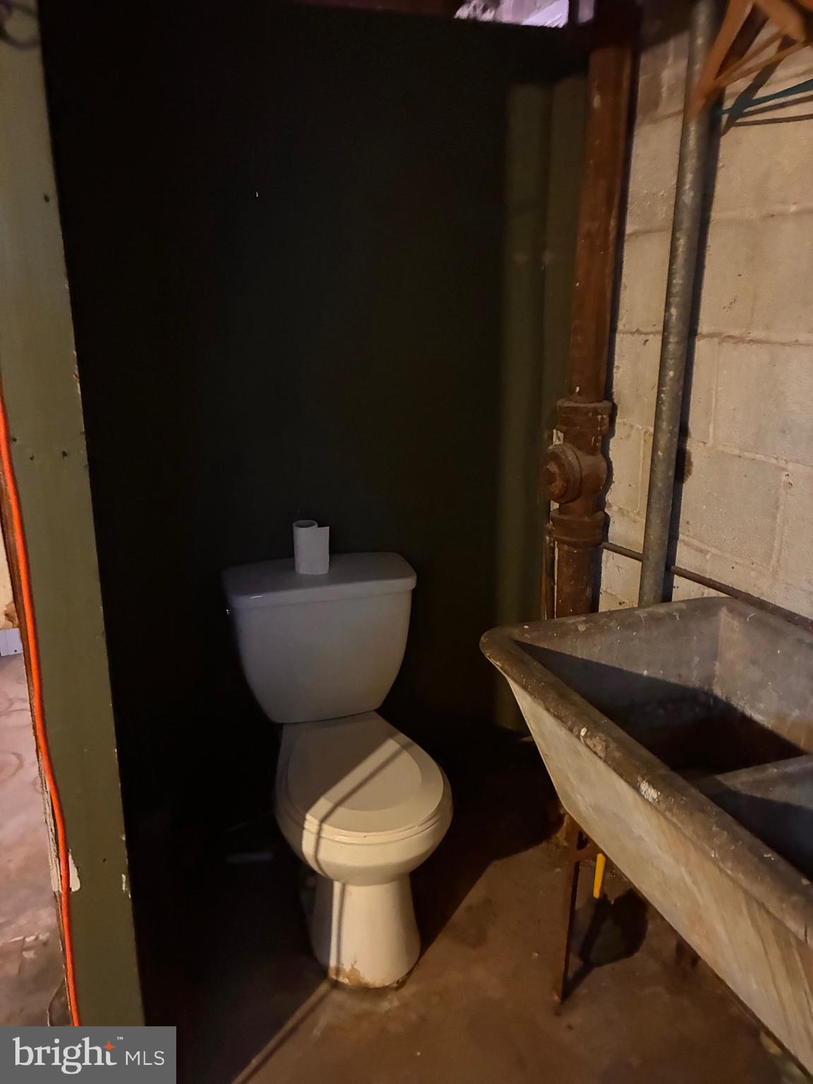 3033 Medway Street Silver Spring, MD 20902 - Photo 37 of 52 Commode by laundry tub