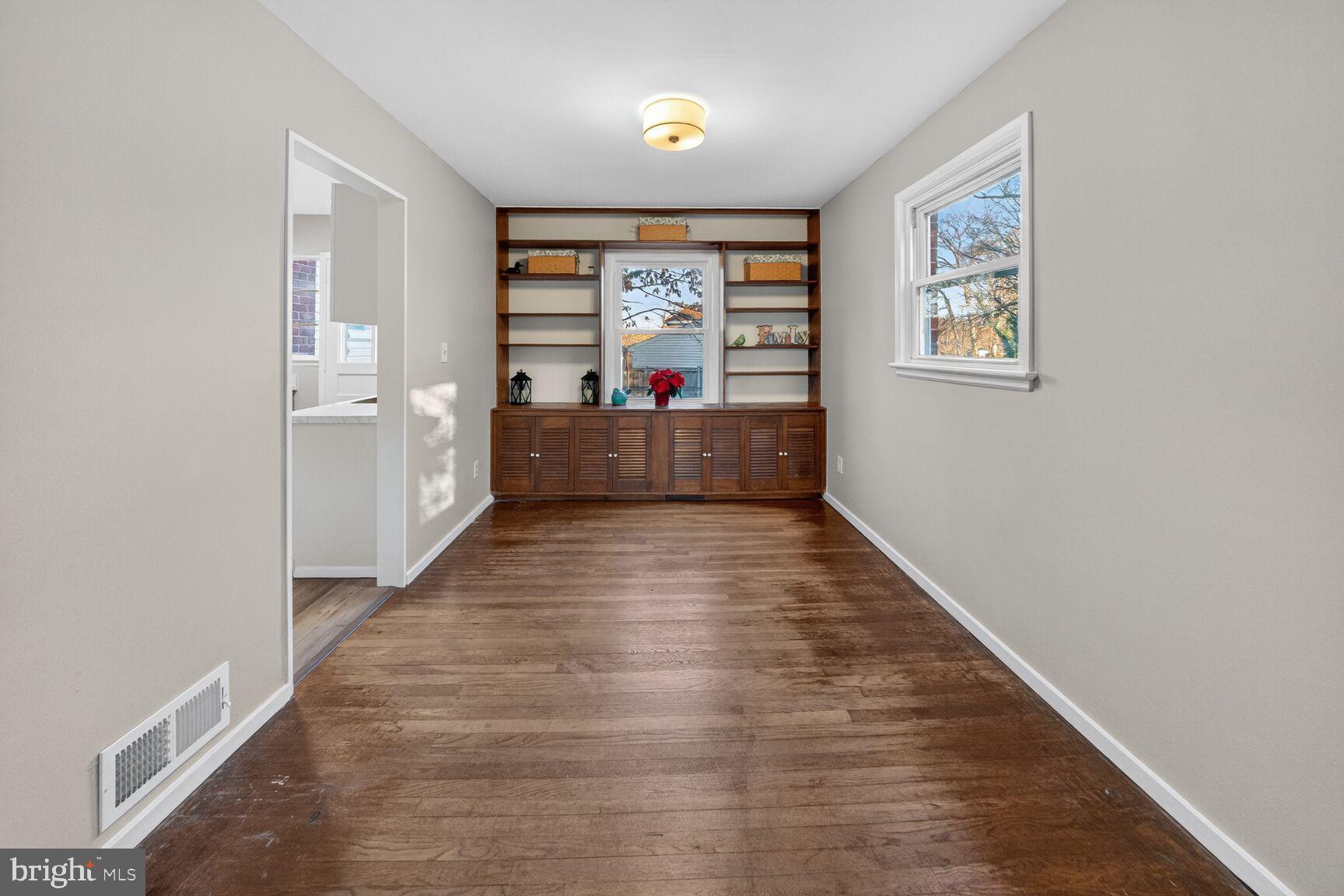 3033 Medway Street Silver Spring, MD 20902 - Photo 7 of 52 a view of entryway with window and wooden floor
