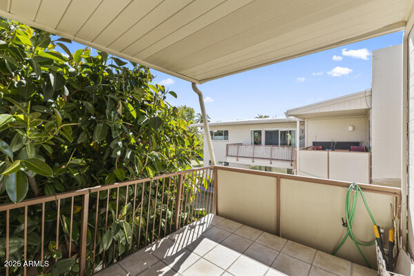 500 West Clarendon Avenue, Unit D6 Phoenix, AZ 85013 - Photo 21 of 23 a view of a balcony with chairs