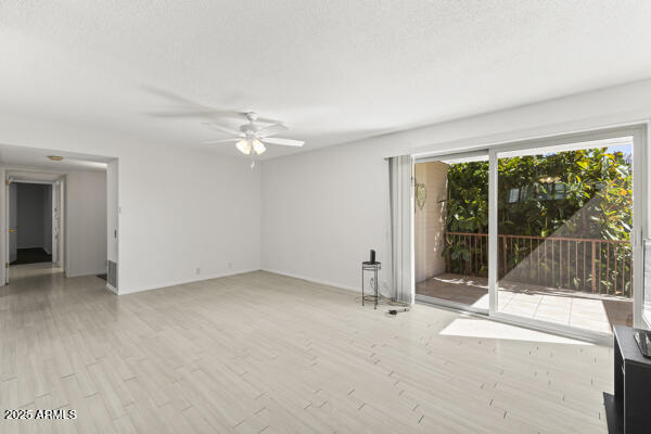 500 West Clarendon Avenue, Unit D6 Phoenix, AZ 85013 - Photo 4 of 23 a view of an empty room with a balcony