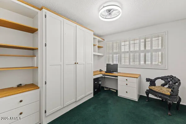 a view of an empty room with a balcony