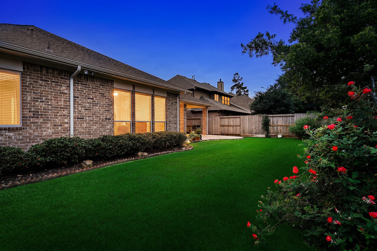 18722 Duke Lake Drive Spring, TX 77388 - Photo 22 of 26 a house view with a garden space