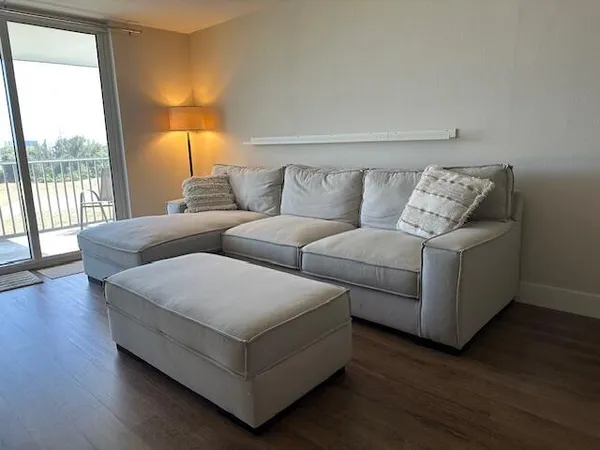 a living room with couches and a coffee table