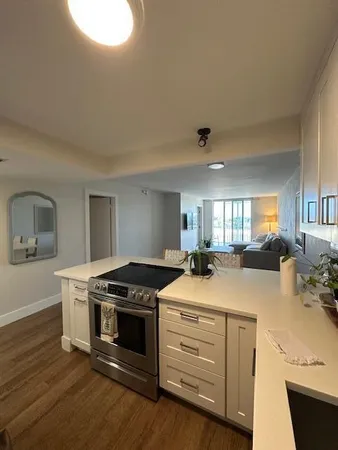 a kitchen with a stove and a sink
