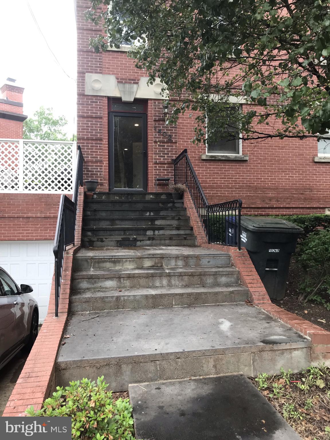 An impressive entrance plus garage and driveway.