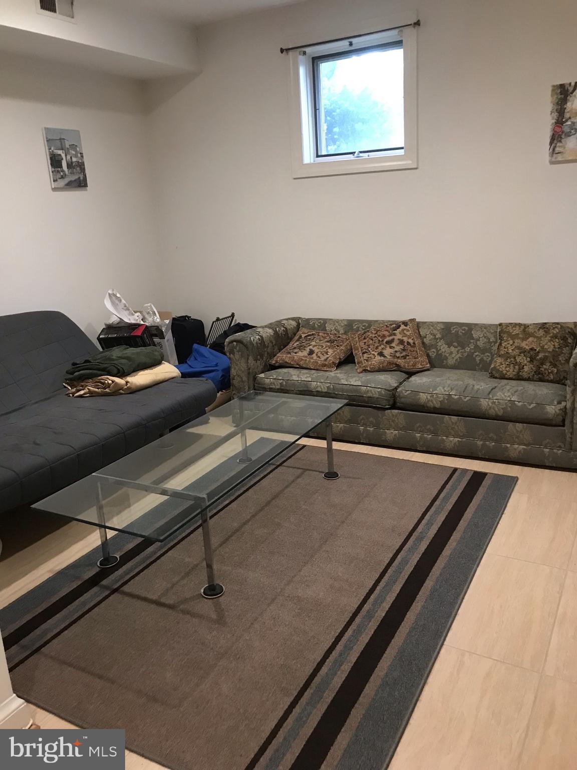 1402 Foxhall Road Northwest Washington, DC 20007 - Photo 21 of 26 Lower level bedroom, bonus room & full bath.