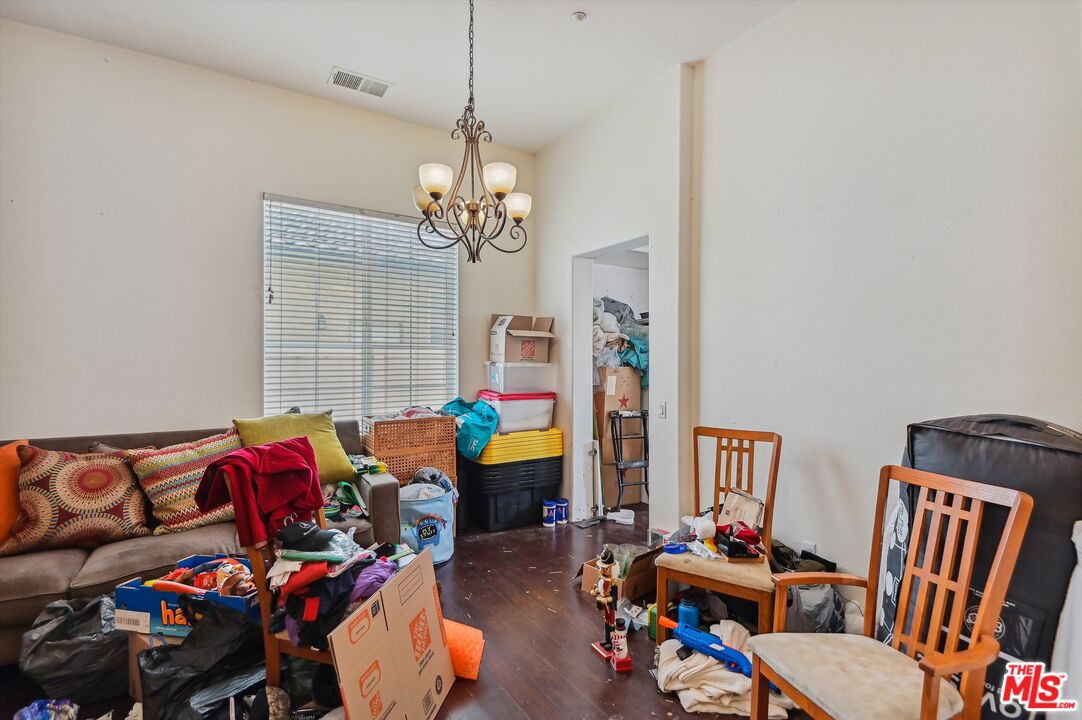 3012 Dunkirk Drive Oxnard, CA 93035 - Photo 6 of 29 a bedroom with furniture and a chandelier