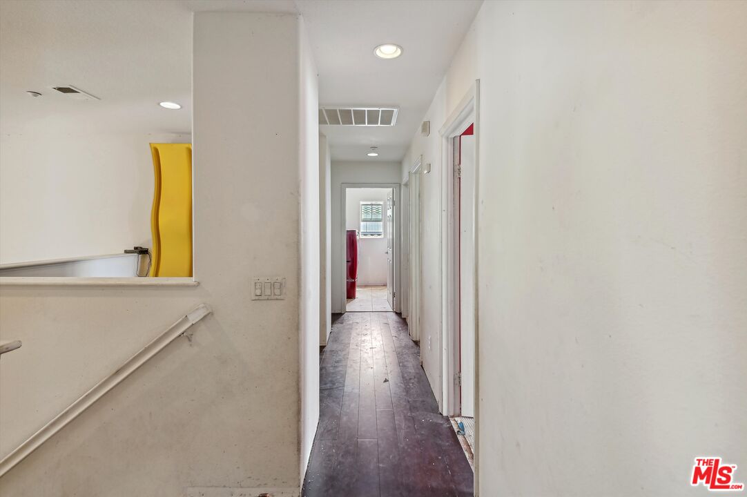 3012 Dunkirk Drive Oxnard, CA 93035 - Photo 9 of 29 a view of a hallway with wooden floor and staircase