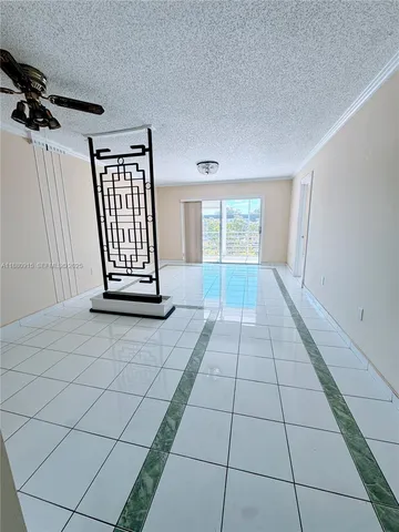 a view of a livingroom with a black and white walls
