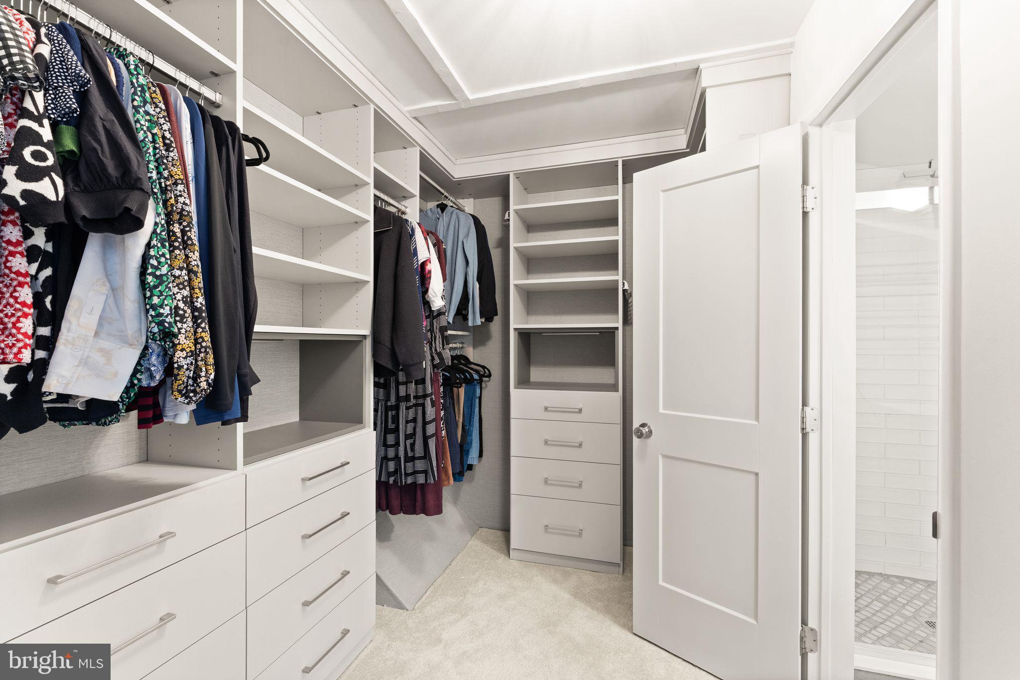 2345 Millennium Lane Reston, VA 20191 - Photo 29 of 55 a view of walk in closet with clothes and shoes