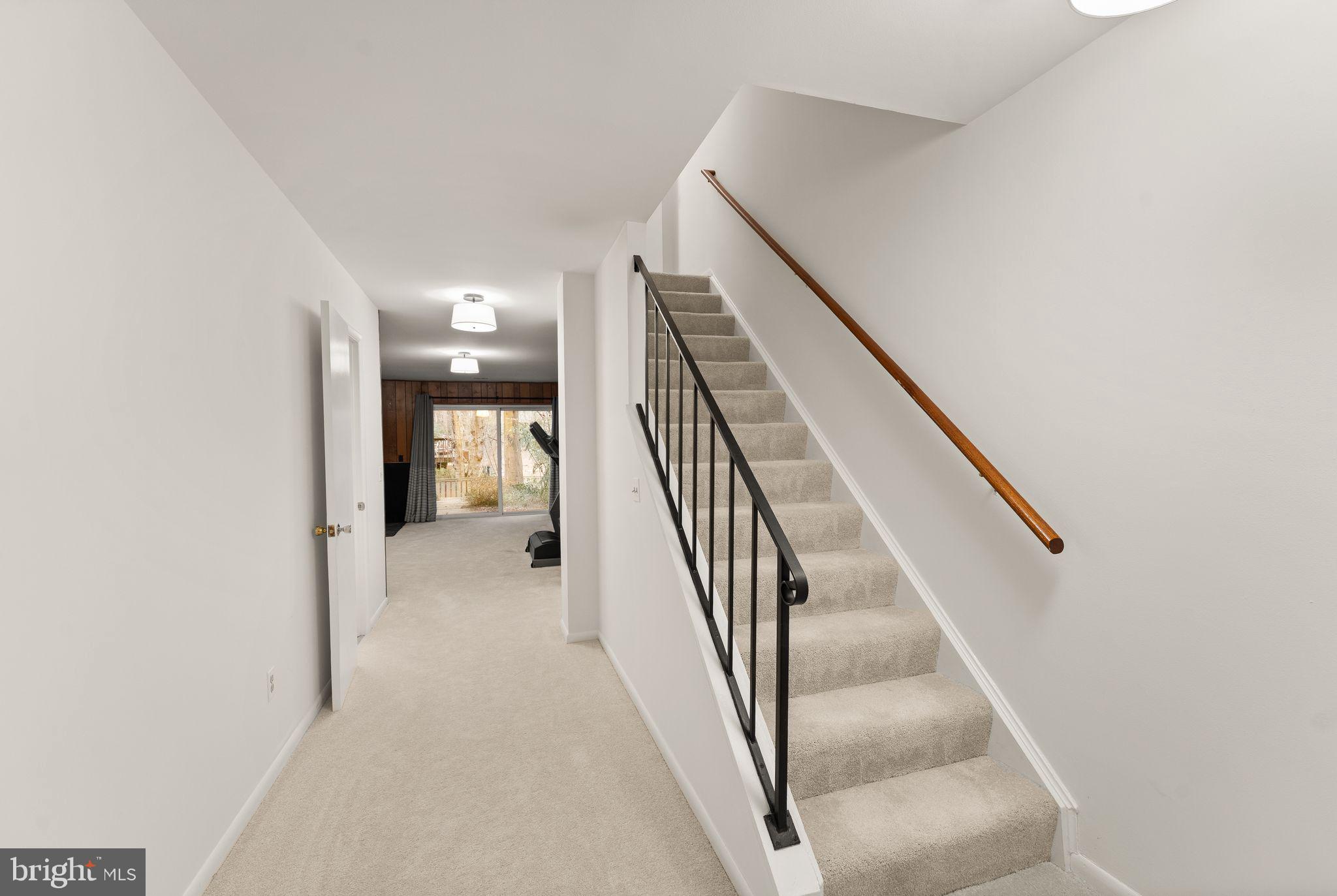 2345 Millennium Lane Reston, VA 20191 - Photo 40 of 55 a view of a hallway with staircase