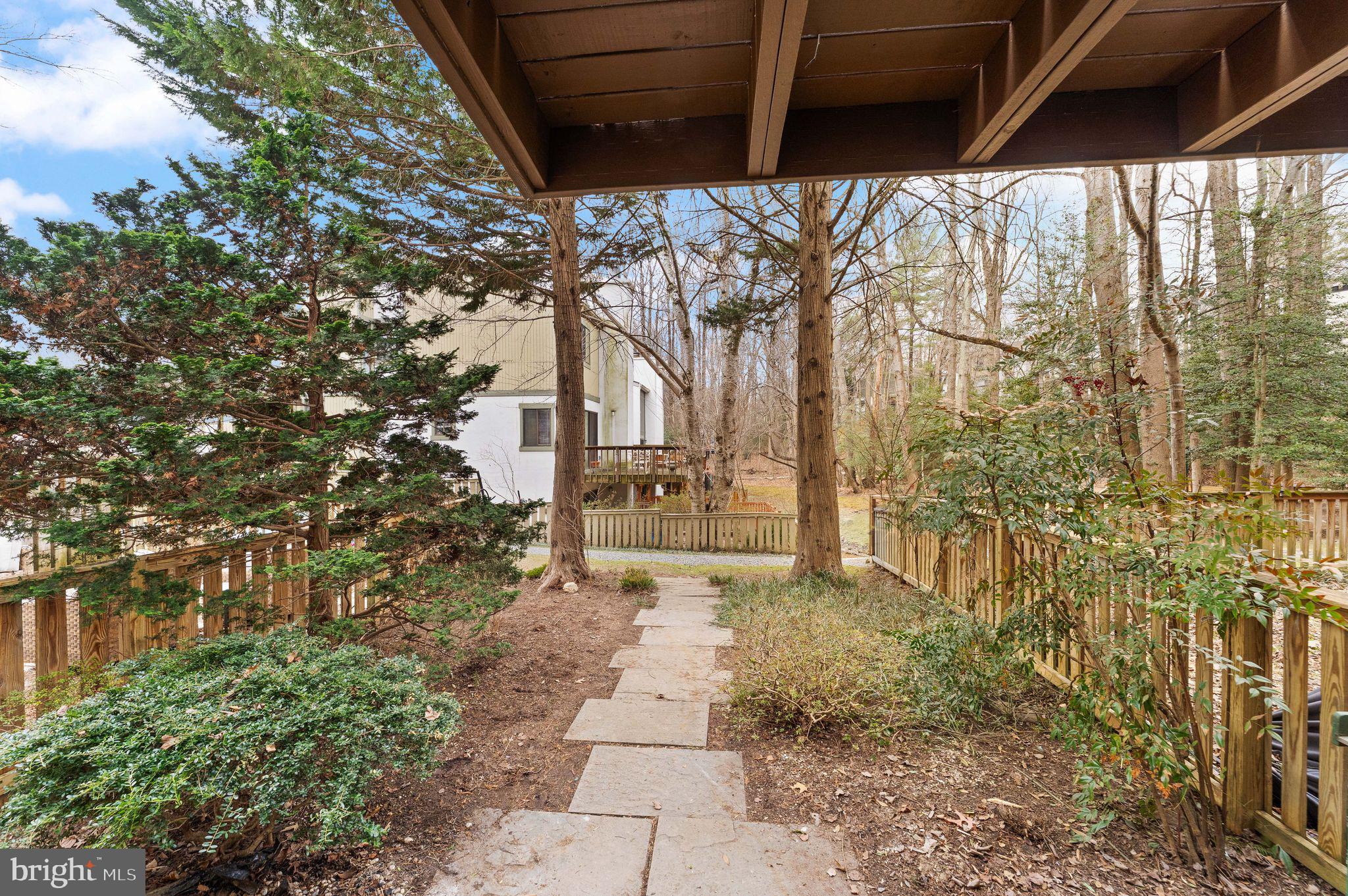 2345 Millennium Lane Reston, VA 20191 - Photo 4 of 55 a view of a pathway of a house with a tree