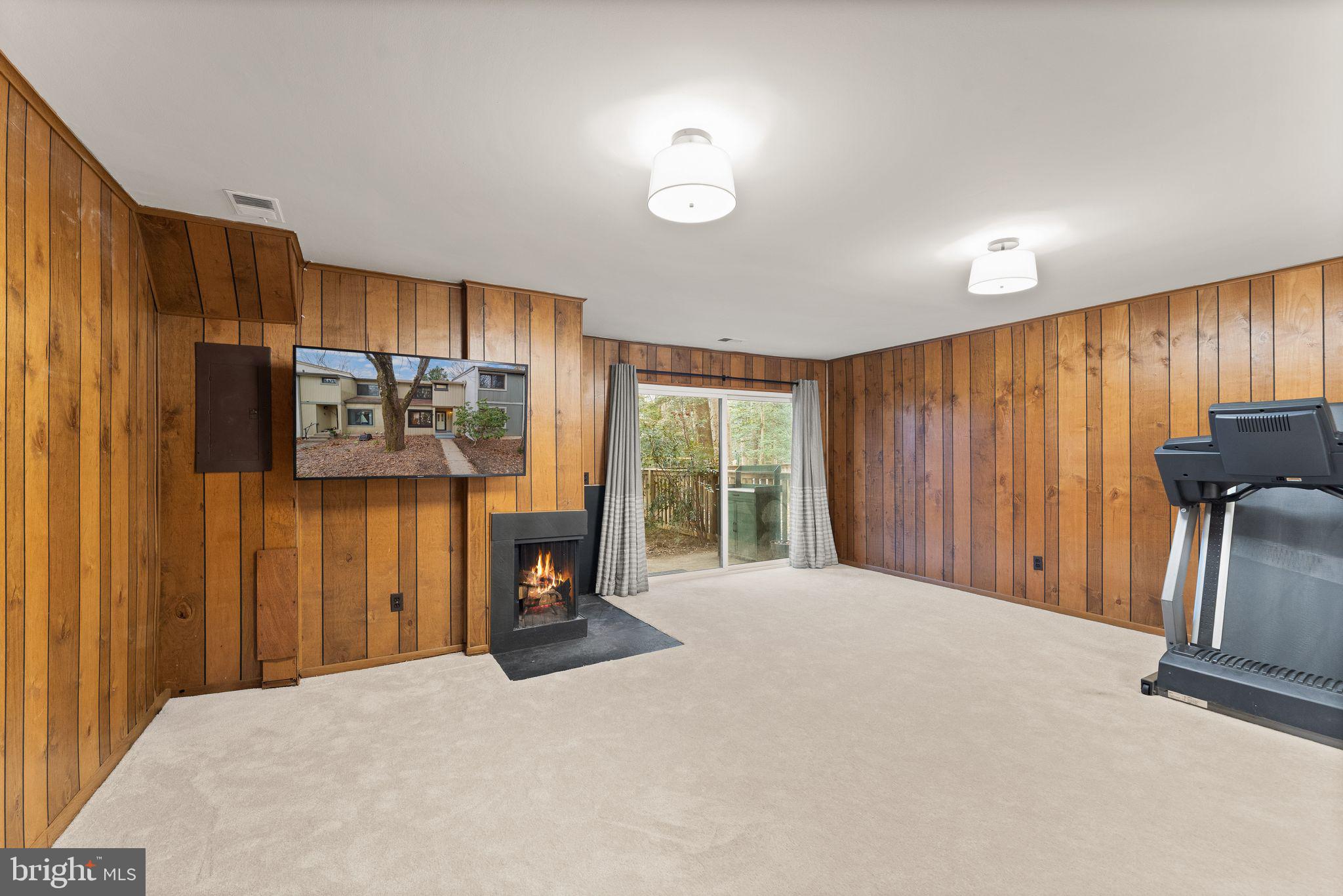 2345 Millennium Lane Reston, VA 20191 - Photo 42 of 55 a bedroom with a bed and wooden floor