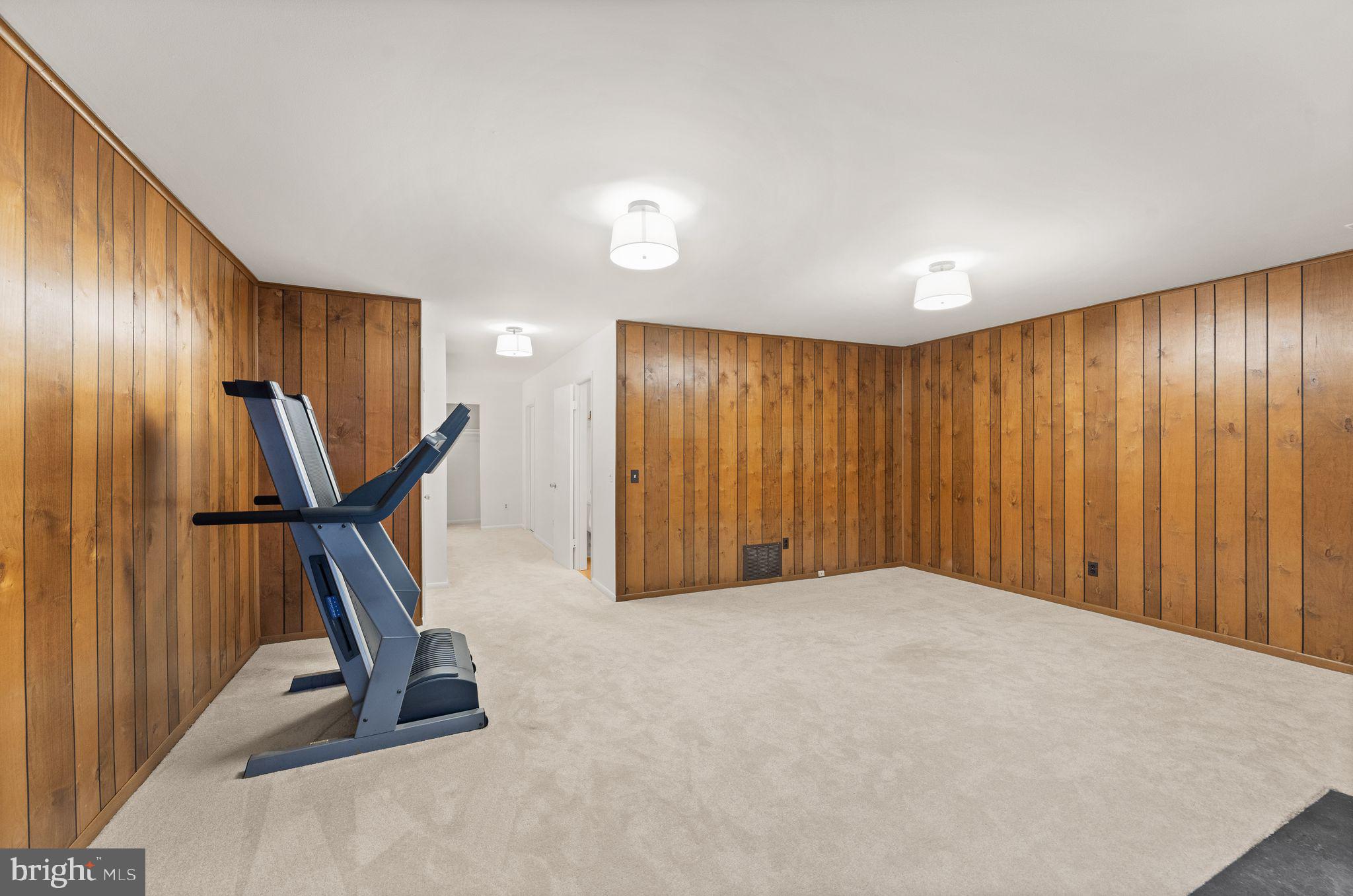 2345 Millennium Lane Reston, VA 20191 - Photo 45 of 55 a view of a livingroom with furniture and a ceiling fan
