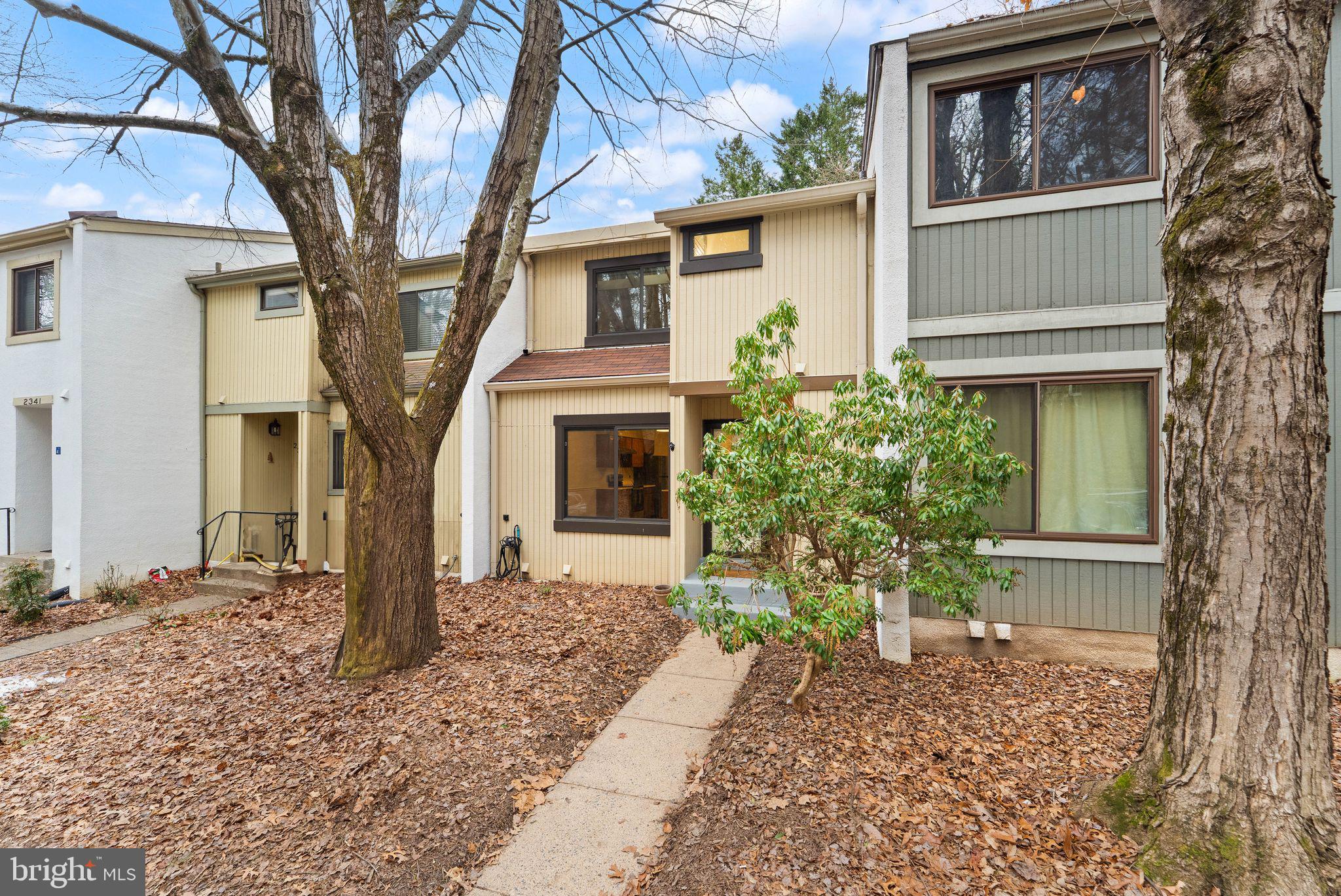 2345 Millennium Lane Reston, VA 20191 - Photo 6 of 55 a front view of a house with garden