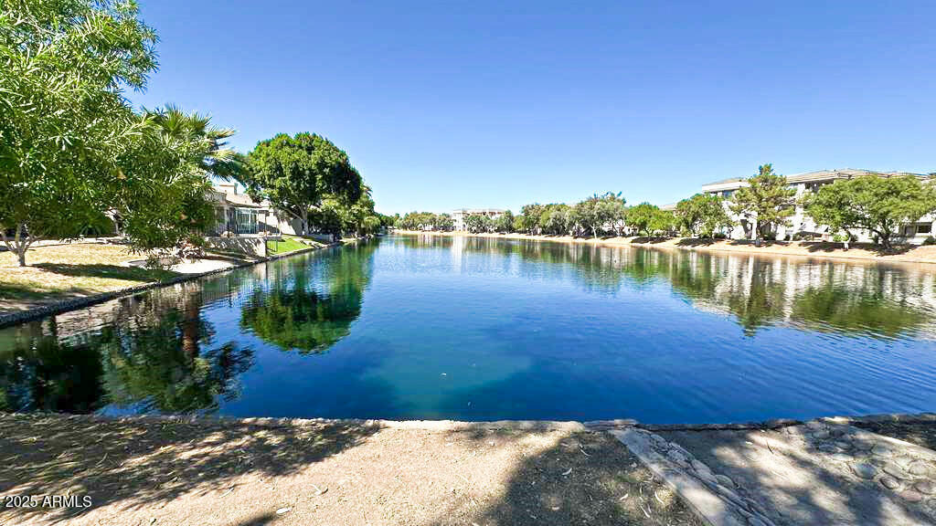4953 South Moss Drive Chandler, AZ 85248 - Photo 49 of 50 a view of a lake with houses