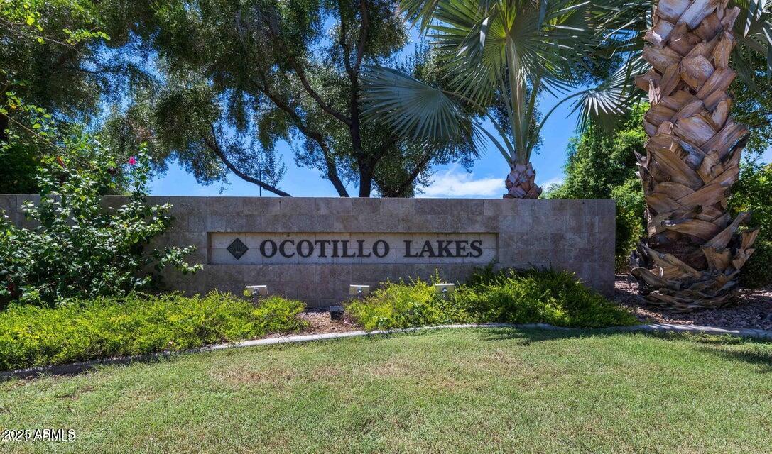 4953 South Moss Drive Chandler, AZ 85248 - Photo 50 of 50 a sign that is sitting in front of flowers