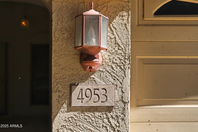 a bathroom with a shower and a toilet